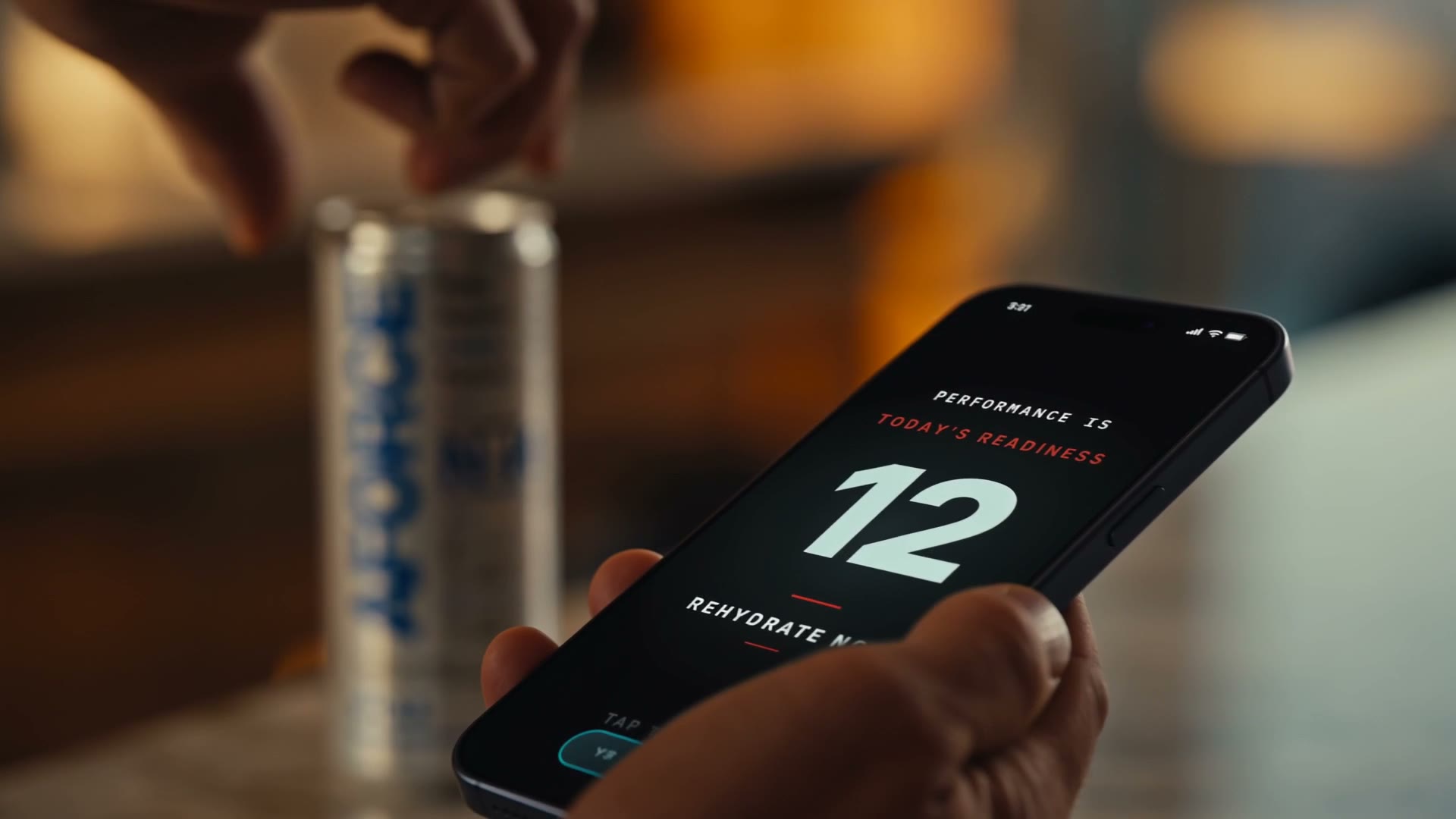 AFORCE OS — the Readiness screen in hand beside the can at golden hour